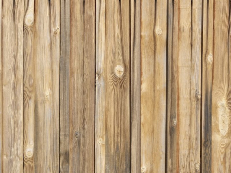 Wooden board fence as abstract rustic background.